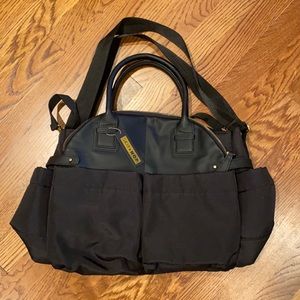 Never been used black Skip hop diaper bag